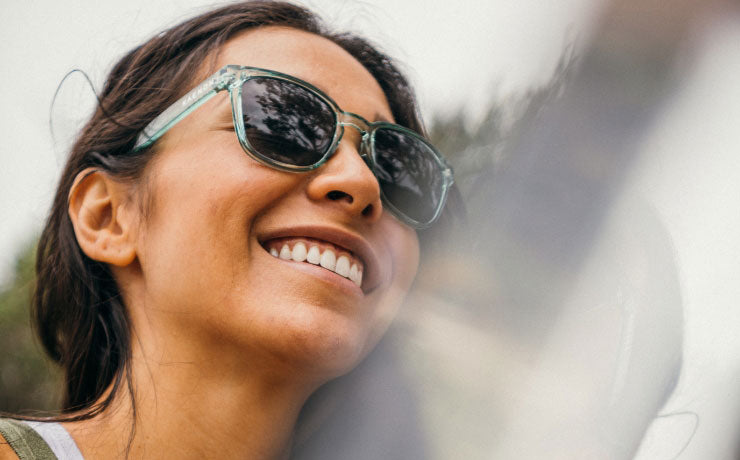 Roark women's adventure-ready sunglasses displaying ultimate happiness and vision clarity for outdoor exploration